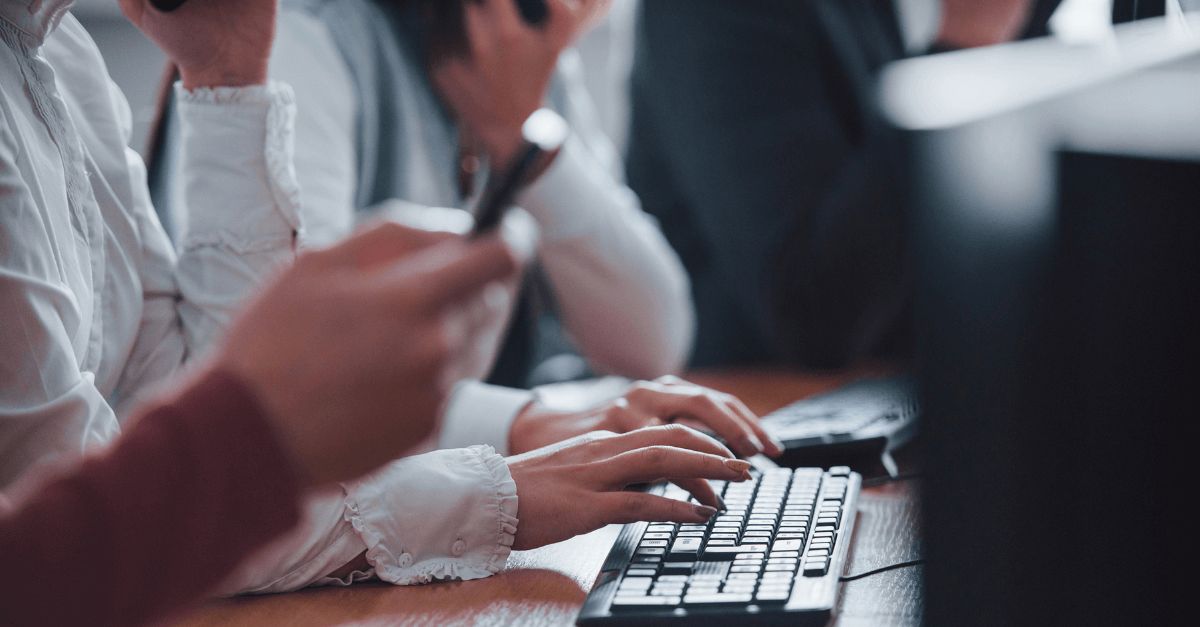 someone typing on a keyboard